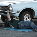 Car maintenance tips: Checking under the hood to ensure your car’s engine is in good condition.