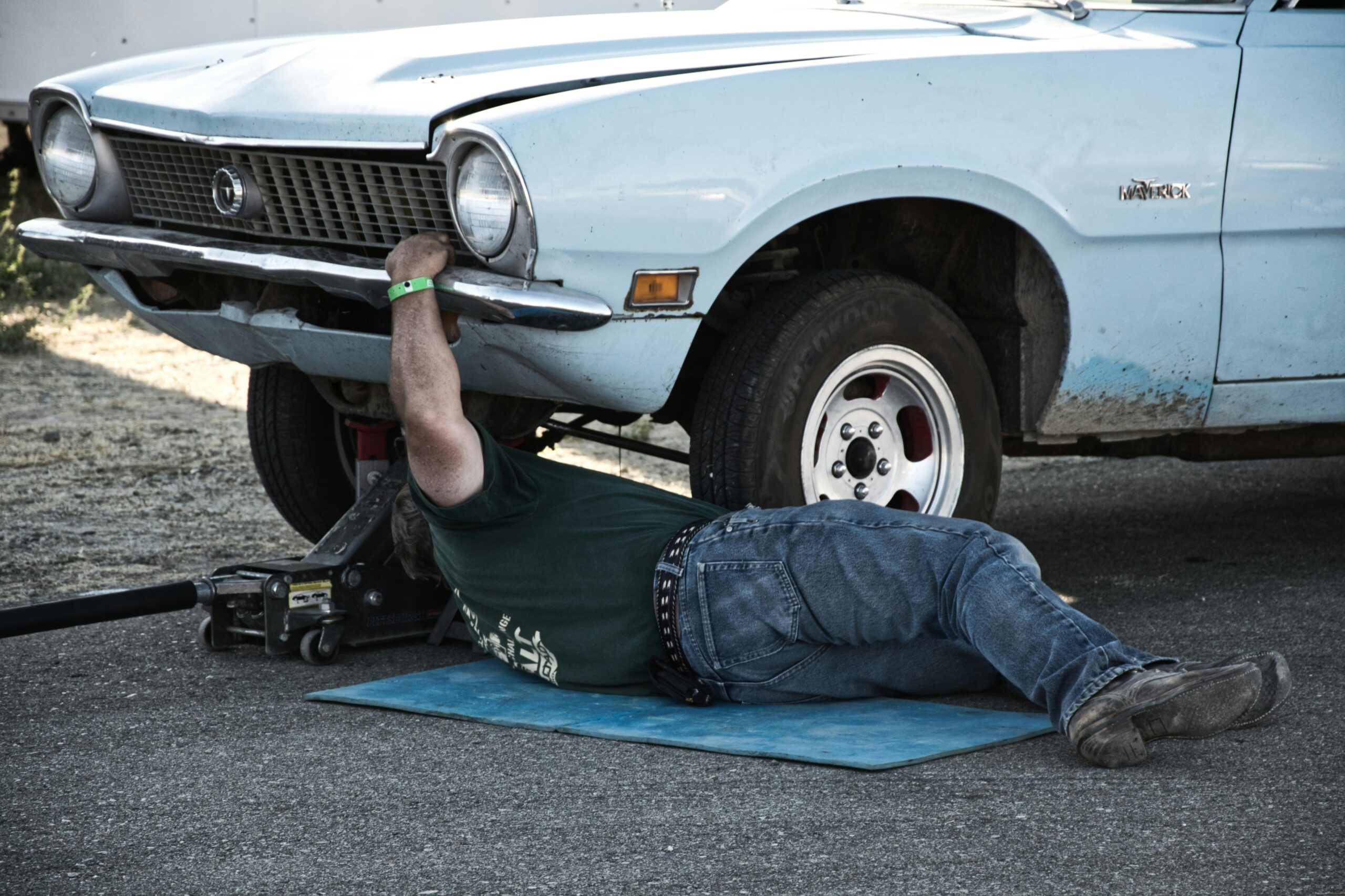 Car maintenance tips: Checking under the hood to ensure your car’s engine is in good condition.